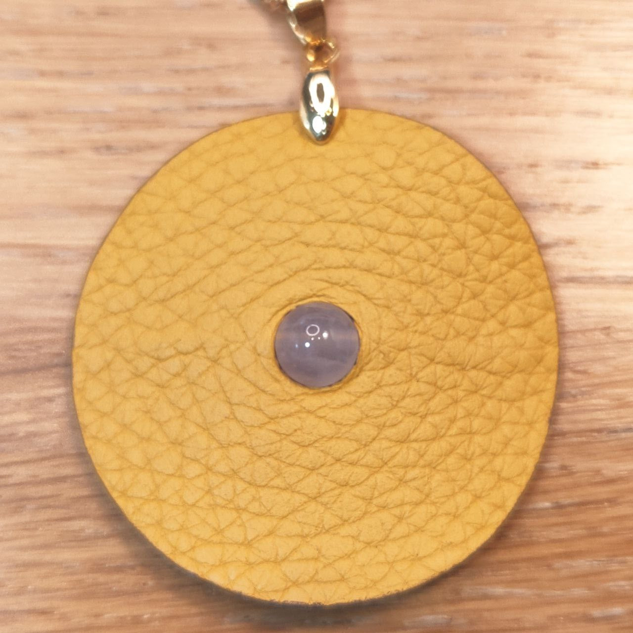 Leather pendant - Large model - In the center